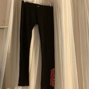 E.vil pants with razor rhinestone leggings.